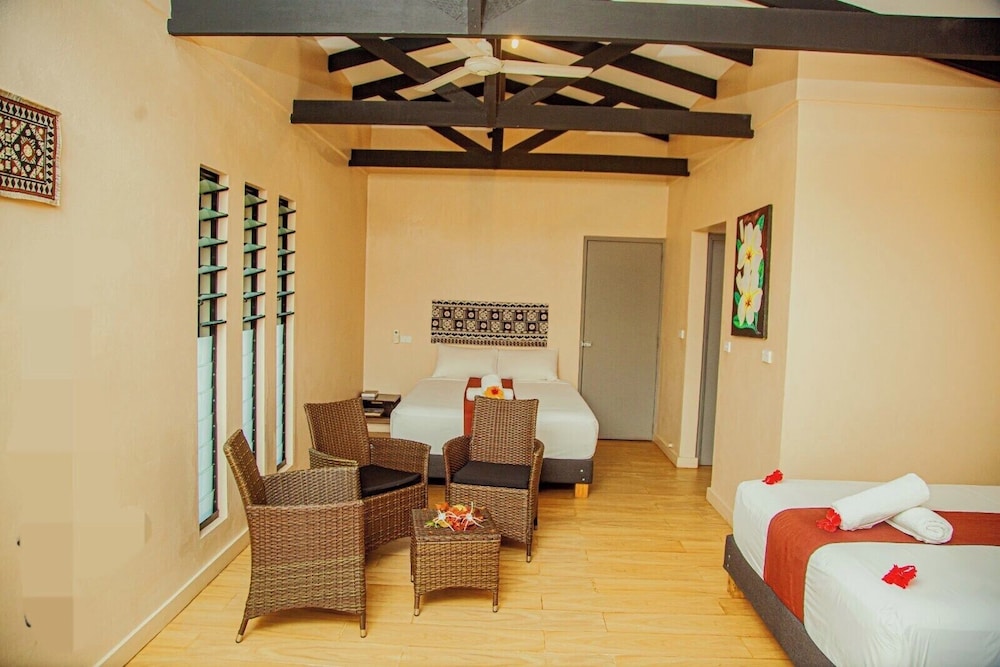 The Deluxe Villa — a bright garden-view room