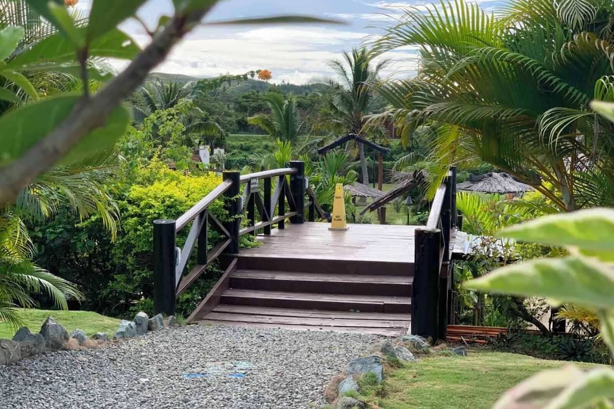 King Family Villa — the sitting area with desk and pool outlook